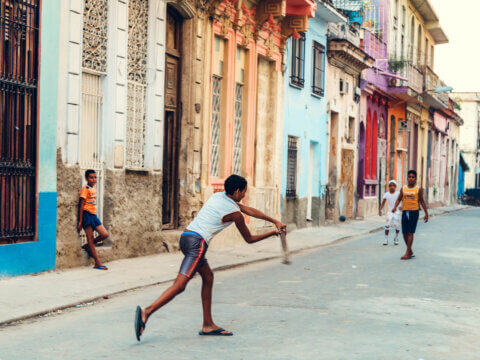 Playing outdoors, in the street, still a way of life in Cuba