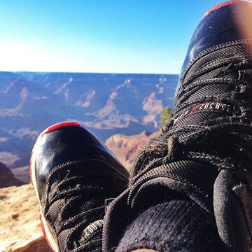 Picture of author wearing Jordan shoes in the Grand Canyon.