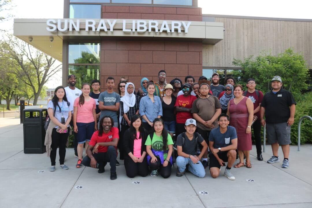 Group photo in front of Sun Ray Library