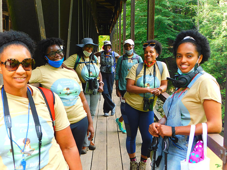 Nicole Jackson, second from left, leading a nature retreat for Black women at Mohican State Park in Ohio.