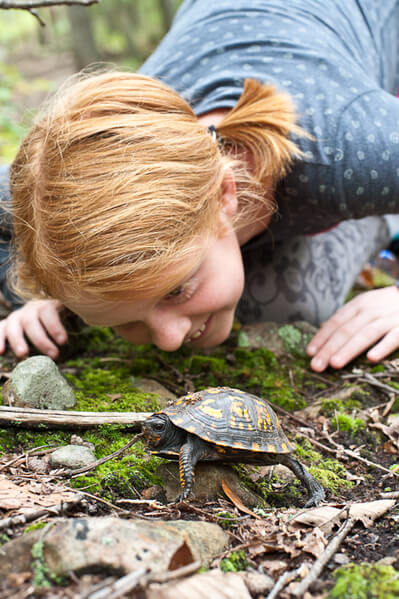 Girl with turtle.